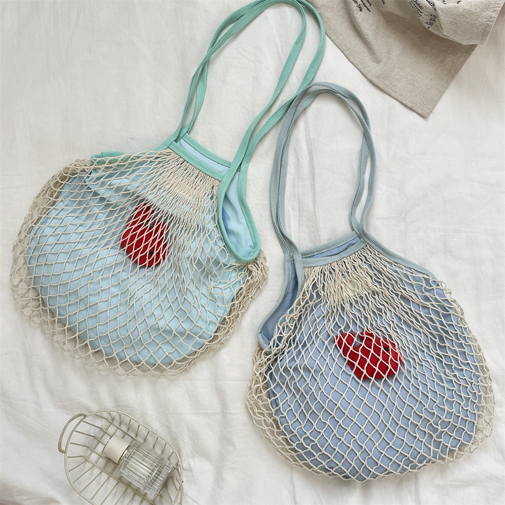 54122 Summer seaside trip simple and niche woven women's bag with a net bag style, fashionable single-shoulder bag, shopping fishing net bag Application Scenario