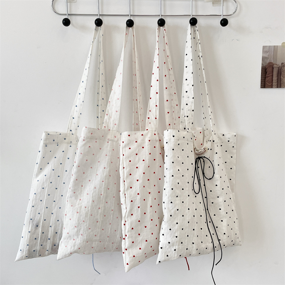 53254 Korean-style laid-back little heart canvas bag, 2025 new single-shoulder tote bag, commuter underarm bag for women full figure