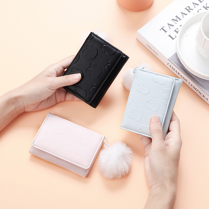 Cross-border women's wallet short solid-color card bag with Japanese and Korean rabbit print buckles and multiple slots, cute coin purse wholesale Application Scenario