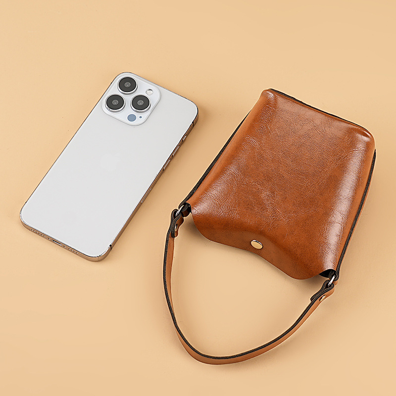 Coin purse, women's handbag, foreign trade niche bucket small bag, grocery bag, earphone bag, hand-held mini coin bag Application Scenario