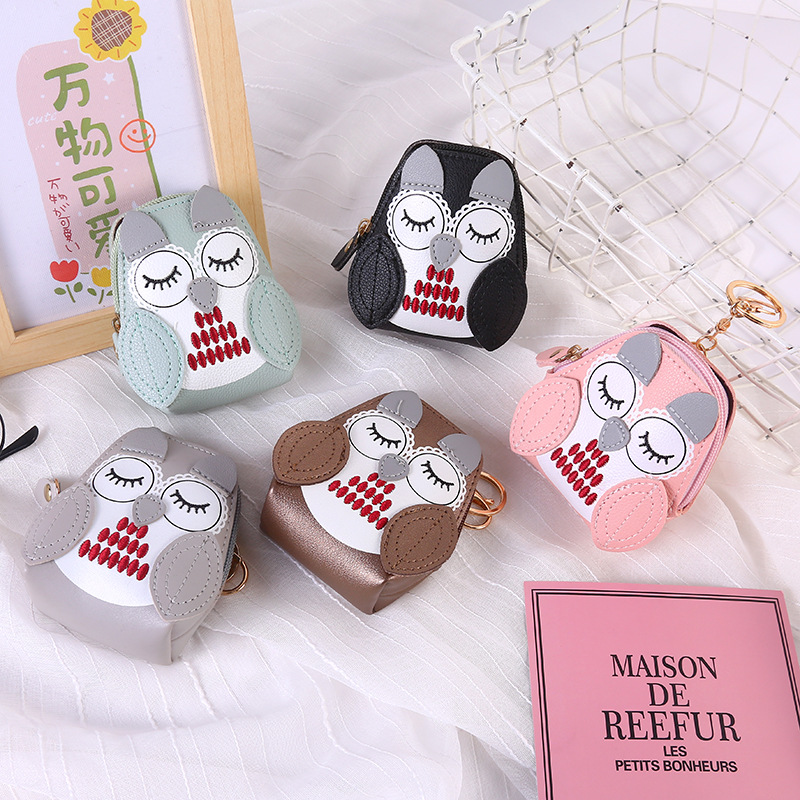 This cute mini coin purse with an ins style for women exudes a sense of luxury. It can be hung around with headphones and a pendant for storing small change full figure