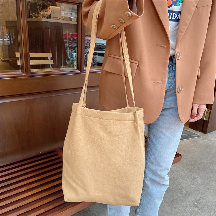 J01 Forest-style washed cotton and linen thin shoulder strap single-shoulder handbag, wholesale of cloth bags, simple and artistic forest-style women's bags Application Scenario