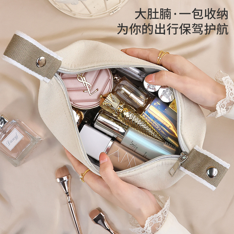 New high-end camellia lipstick, mobile phone, watch, key and travel storage bag, canvas portable hand-held Specification drawing
