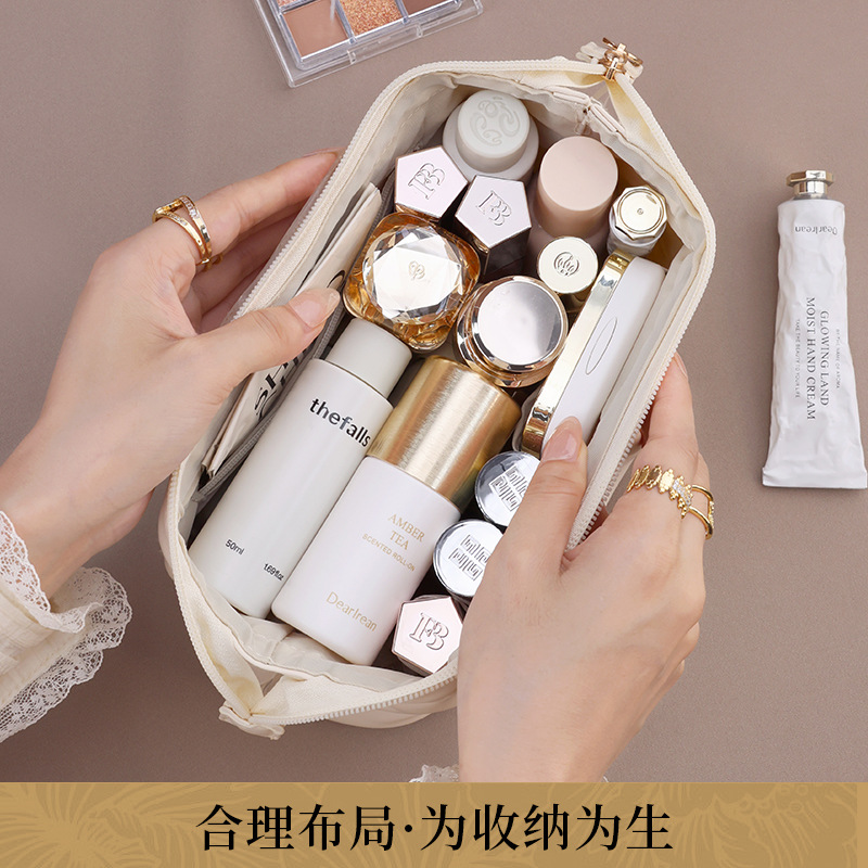 The large-capacity and high-end makeup bag pairs well with the small-mouthed red envelope portable and popular storage bag details Picture