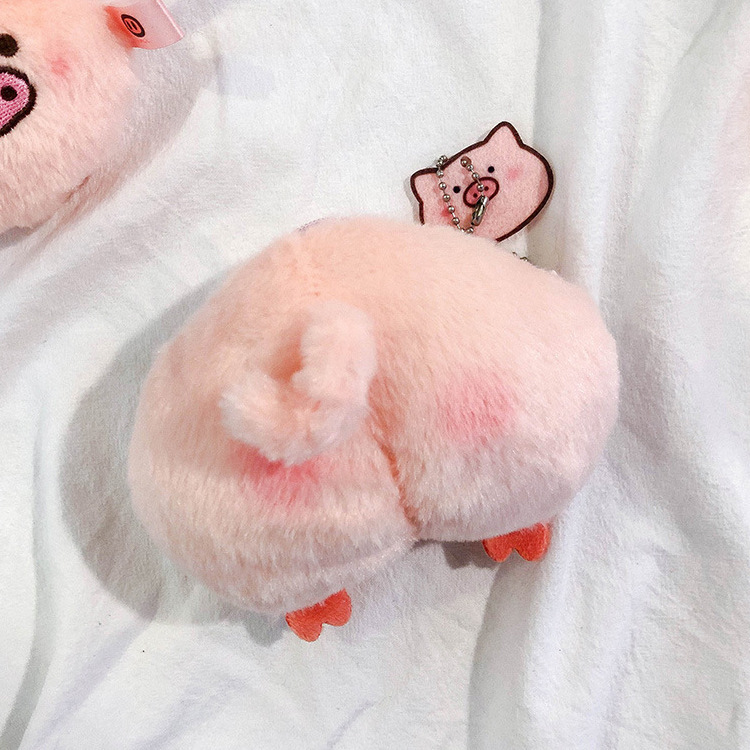 A trendy pig-nosed plush coin purse with an Ins-style cute mini cartoon headphone case and keychain pendant Application Scenario
