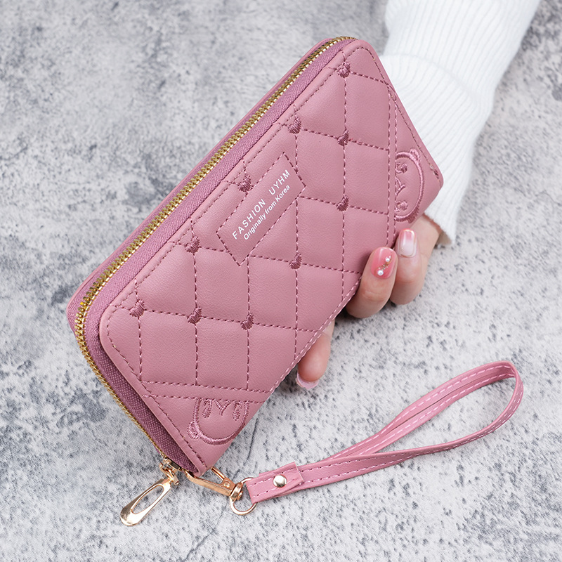 A fresh and sweet mid-length women's wallet in stock for the 2023 summer. It's a solid-color PU leather embroidered wallet full figure