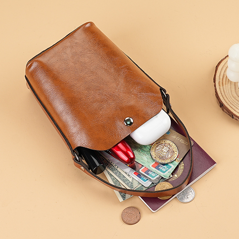 Coin purse, women's handbag, foreign trade niche bucket small bag, grocery bag, earphone bag, hand-held mini coin bag details Picture