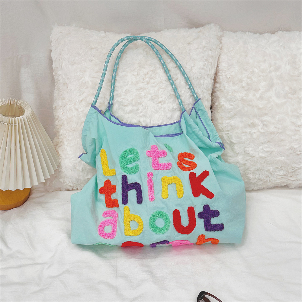 4653 Korean-style ins large-capacity tote bag, laid-back style lettered canvas single-shoulder bag, women's portable shopping bag Application Scenario