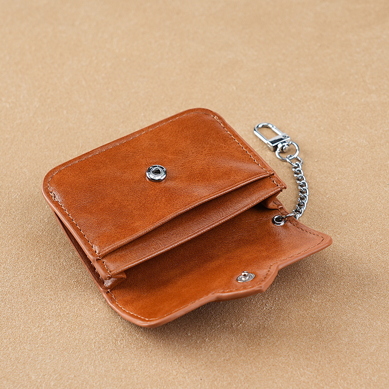 The oil wax leather coin wallet is a high-end, heartwarming, convenient mini bag for both men and women, with multiple compartments and anti-magnetic card bags. It comes with two certificates Specification drawing