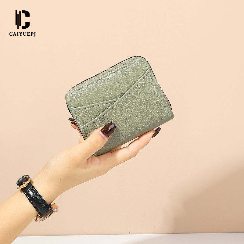 The new cross-border compact card pocket coin purse is fashionable and trendy. It features a simple Japanese organ wallet with multiple slots for Instagram women details Picture