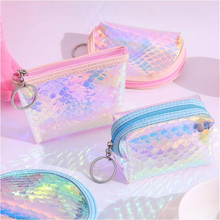 A mini, cute and compact coin purse for women, holding a transparent pvc keychain for convenient coin storage details Picture