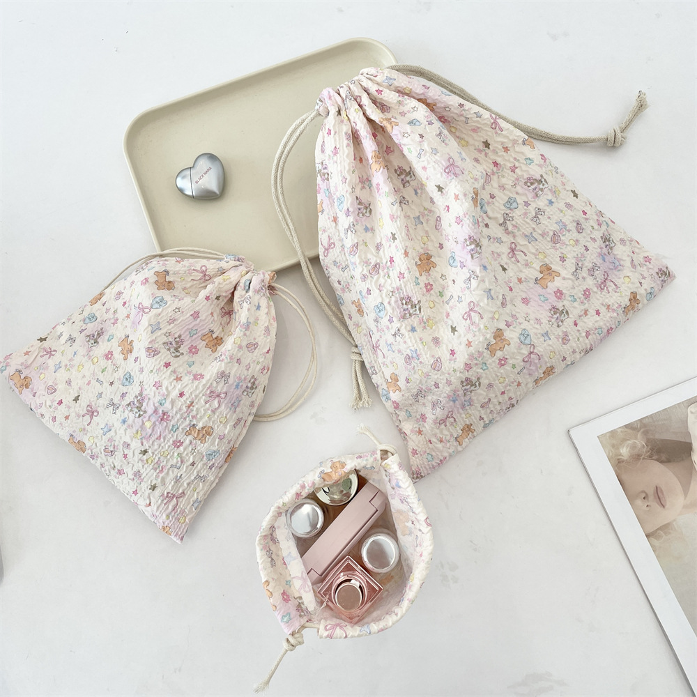 53314 [Copyright Version] Embossed cartoon drawstring bag Dust-proof portable organization cloth bag Drawstring cosmetics storage Application Scenario
