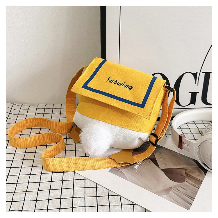 This trendy canvas small bag is cute and playful for girls. It's a fashionable and versatile single-shoulder bag with a duck bottom. It's a casual crossbody small backpack Specification drawing