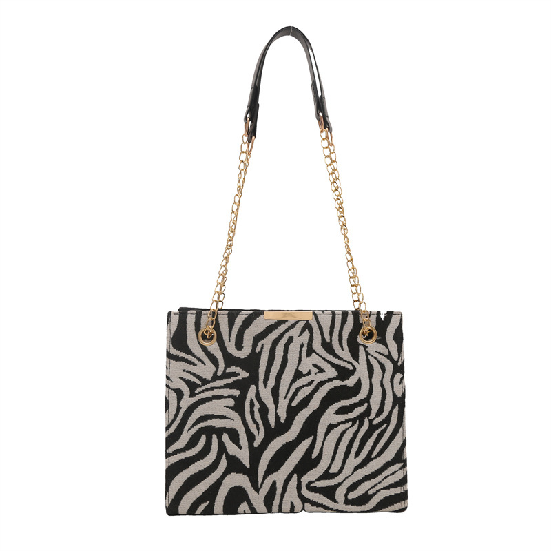 A niche design leopard print bag for women, a new spring 2025 trendy and fashionable single-shoulder chain bag, a personalized single-shoulder bag for women Item Picture