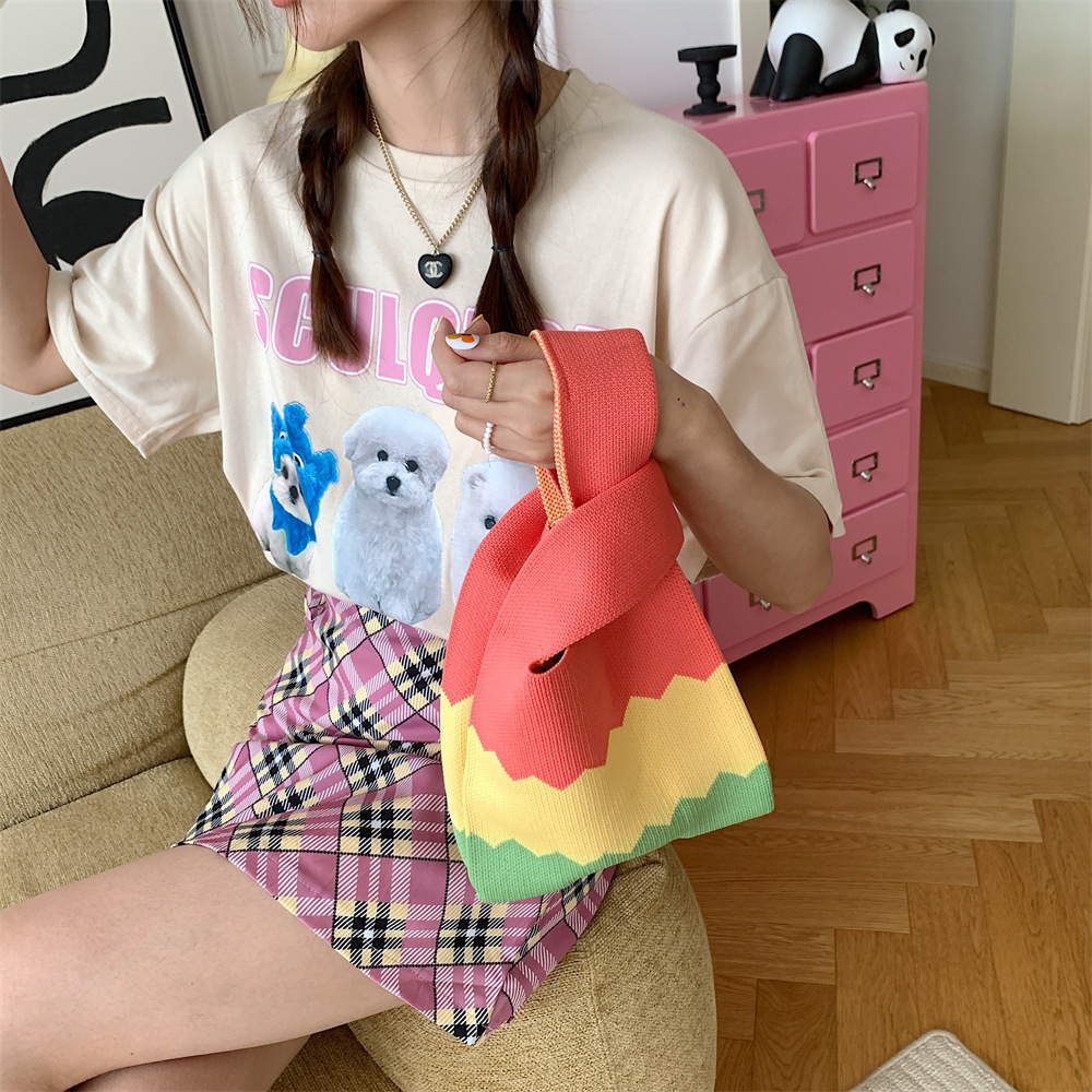 3711 New knitted floral wool bag, hand-held bag, handbag, little cat wrist bag, striped storage bag full figure