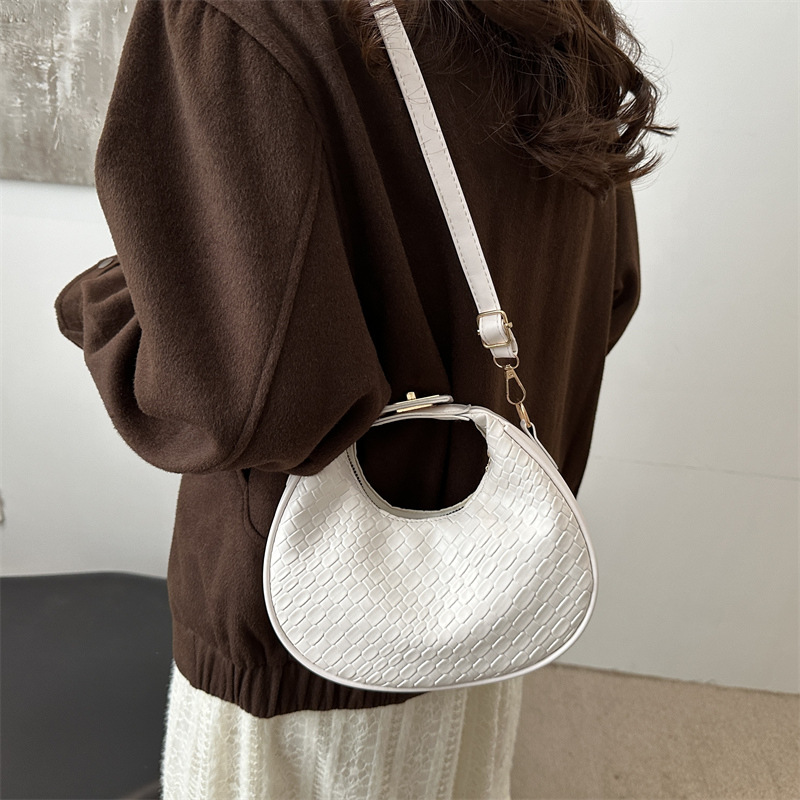 Spring 2025 new large-capacity crossbody single-shoulder hand-held women's bag, a simple and elegant European and American retro woven pattern bag Specification drawing