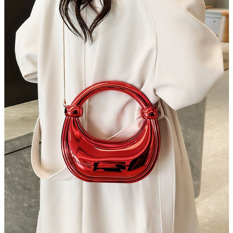 European and American cross-border 2025 Double Knot Crescent Moon Bag, gold and silver ornaments, home decoration handbag, makeup acrylic bag Application Scenario