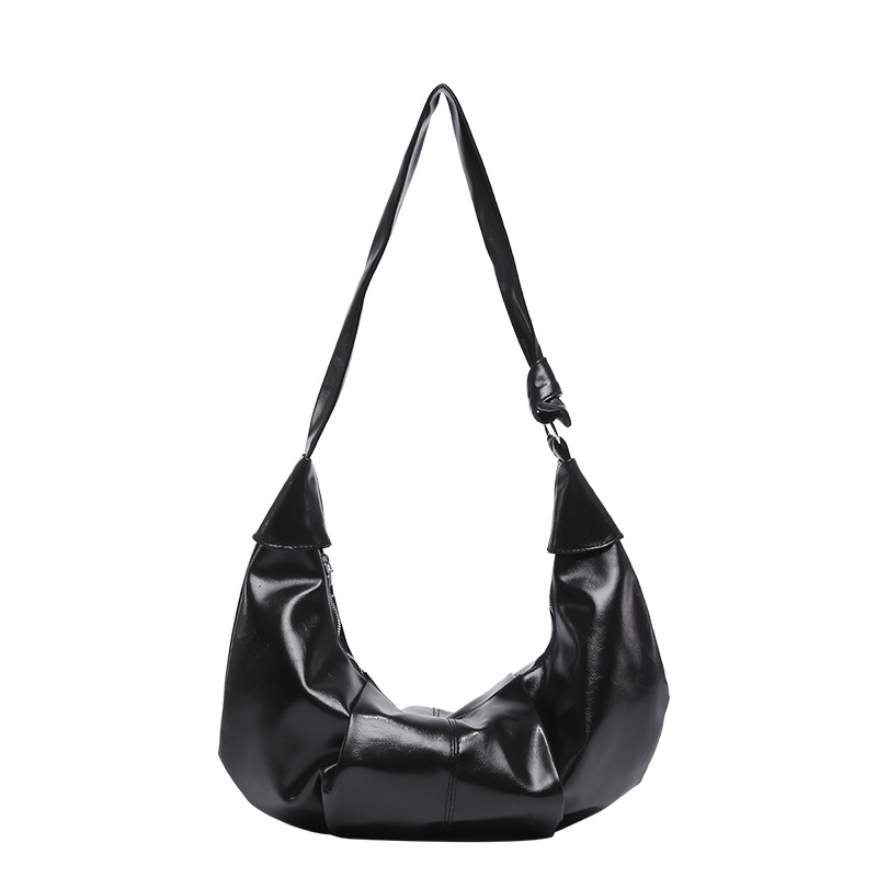 A new 2024 Korean-style shiny soft leather bag for women, featuring a laid-back style with pleated dumplings and a large capacity trendy single-shoulder bag Item Picture