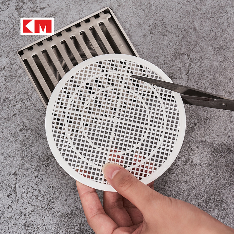 Japanese KM bathroom anti-hair, hair filter and hair-blocking net, kitchen sink anti-clogging wonder, plastic floor drain sticker Application Scenario
