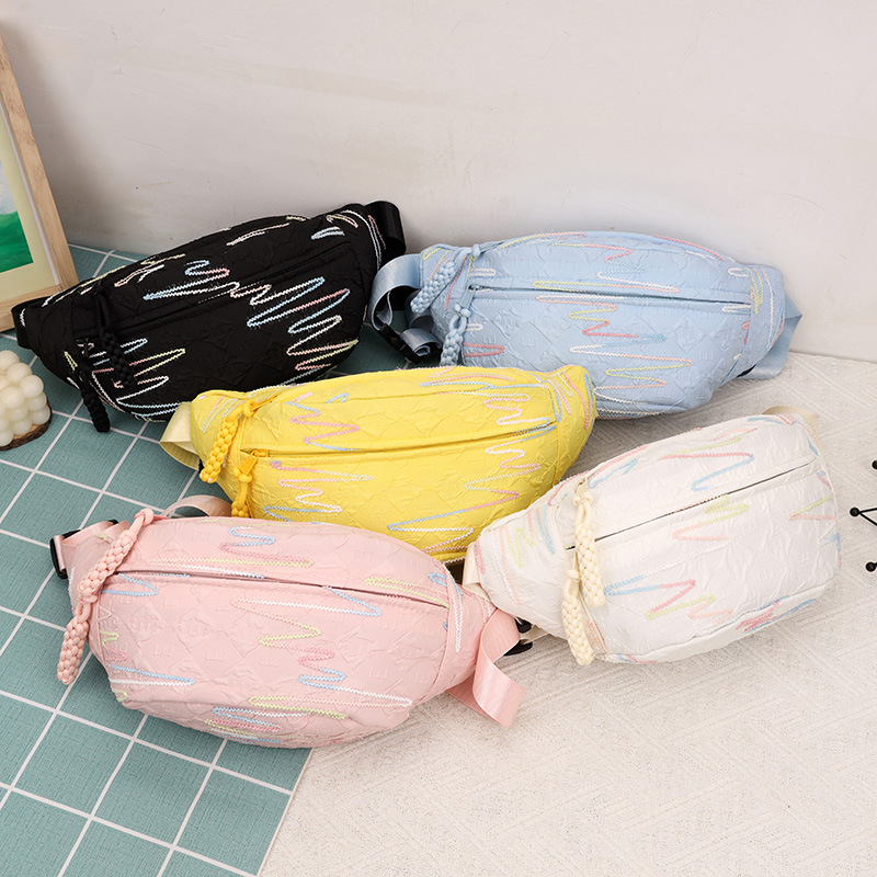 A stylish girl's small backpack with Korean InS-style rhythmic striped embroidered tassel crossbody bag, casual and versatile dumpling bag Application Scenario
