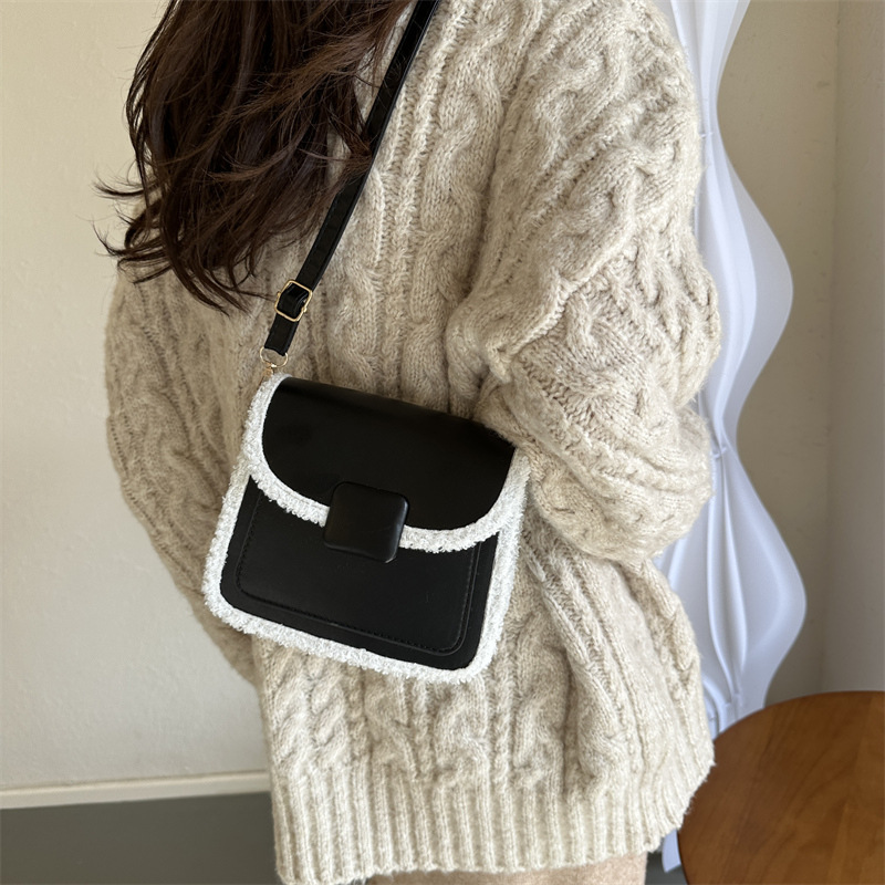 The 2024 new women's bag, a high-end retro small bag with a trendy color contrast, is versatile and stylish. It's a furry crossbody bag and a small square bag details Picture