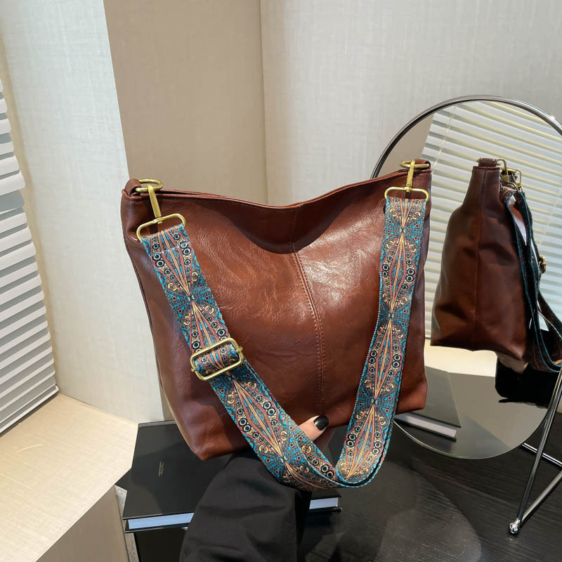 Fashionable and simple women's 2024 new high-end commuter tote bag, large capacity versatile crossbody bag, bucket bag full figure
