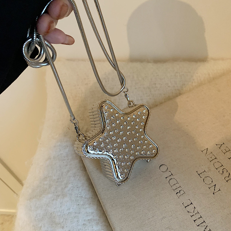The Star Bag is a niche design mini box bag for women. It's a new 2024 chain handbag and a stylish single-shoulder crossbody bag full figure