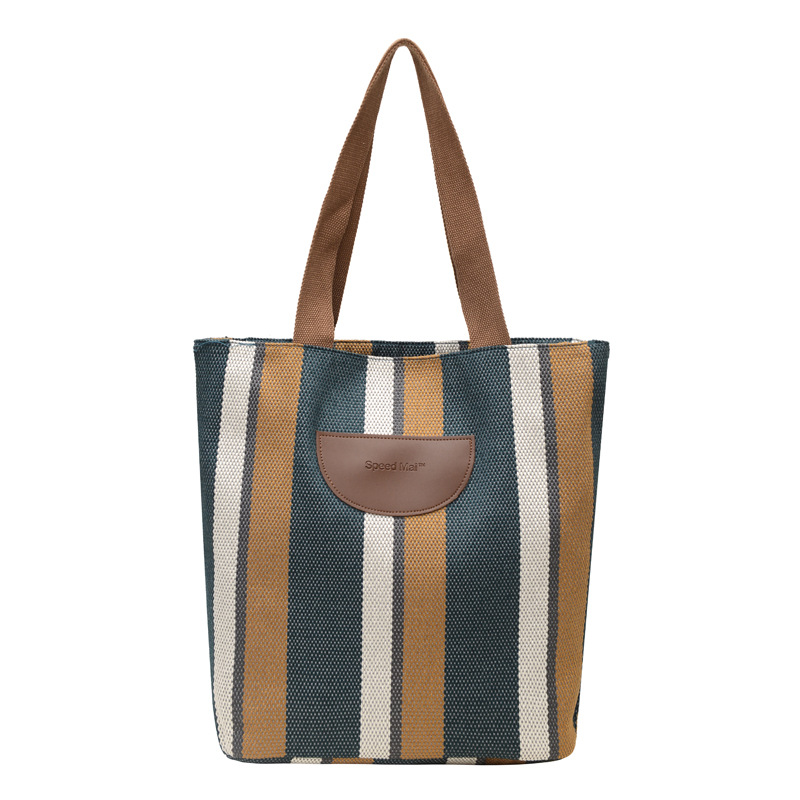 Cross-border fashion striped printed bucket cloth bag 2025 New style color-blocking versatile hand-held cloth pocket single-shoulder bag Item Picture