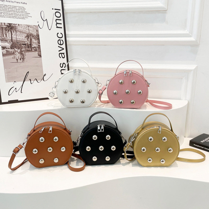 Cross-border high-end retro small round bag for women, Spring 2025 new style, casual and versatile, commuting hand-carry underarm bag trend Application Scenario