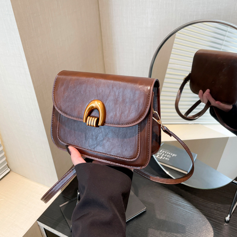 Korean-style quality crossbody bag for women, new Spring 2025 casual commuting single-shoulder bag, fashionable and trendy hand-held saddle bag full figure