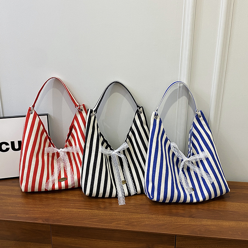 Striped double-sided single-shoulder bag, new summer cute printed letter canvas bag, large capacity simple letter commuting bag full figure