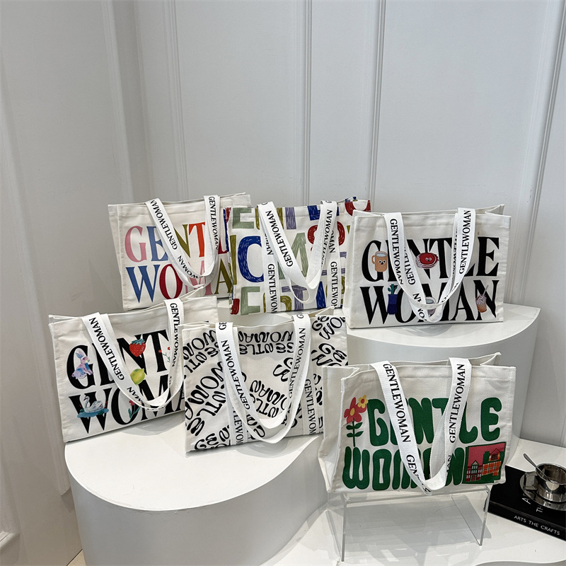 Letter canvas bag for women, large capacity 2024 new commuter bag, versatile tote bag, single-shoulder mommy bag Application Scenario