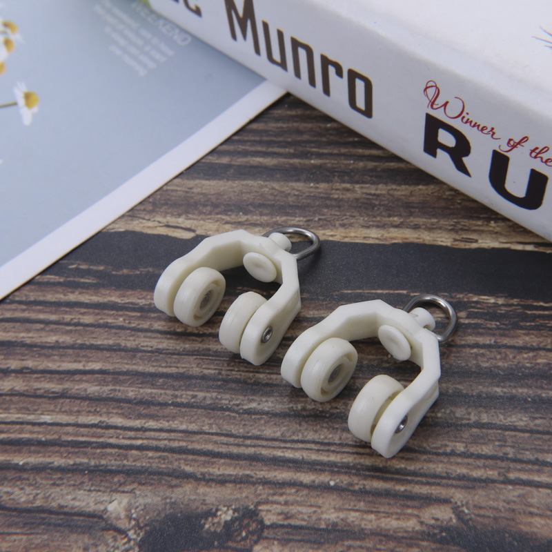 The manufacturer supplies silent metal curved rail wheels, sliding wheels, stainless steel curtain track accessories, and curved wheels in curtain tracks Specification drawing