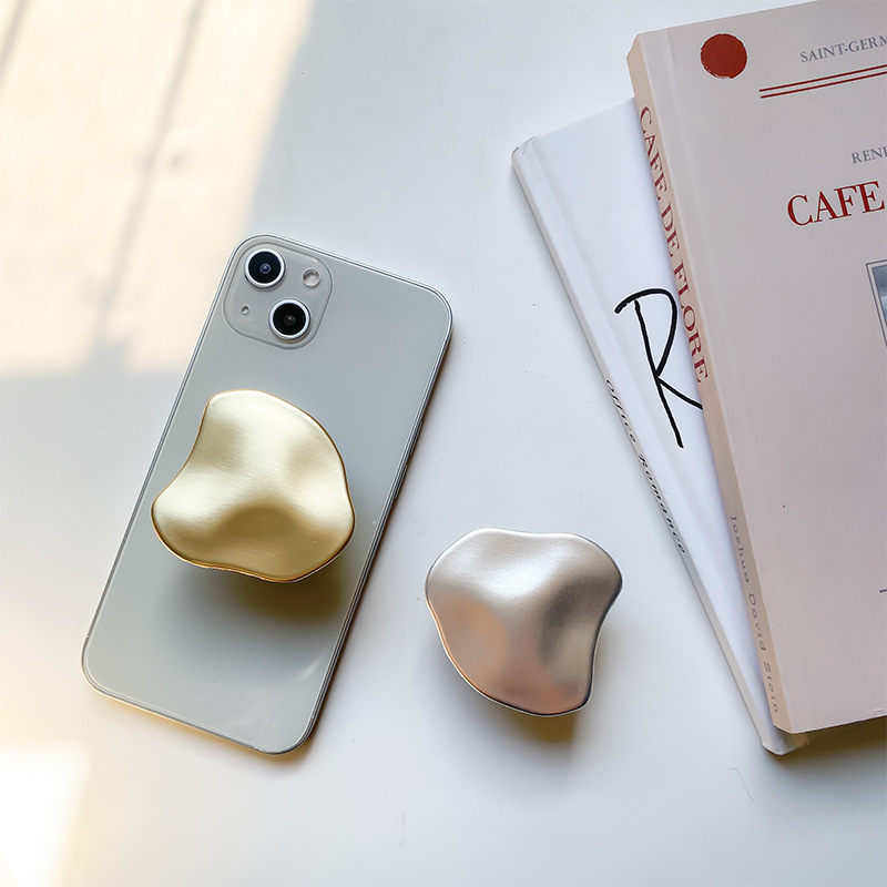 Metal high-end electroplated mobile phone airbag stand, adhesive retractable desktop air cushion support, back adhesive ring buckle full figure