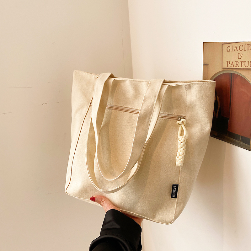Solid color simple single-shoulder bag, 2024 new large-capacity fashionable lightweight tote bag, niche popular and beautiful canvas bag details Picture