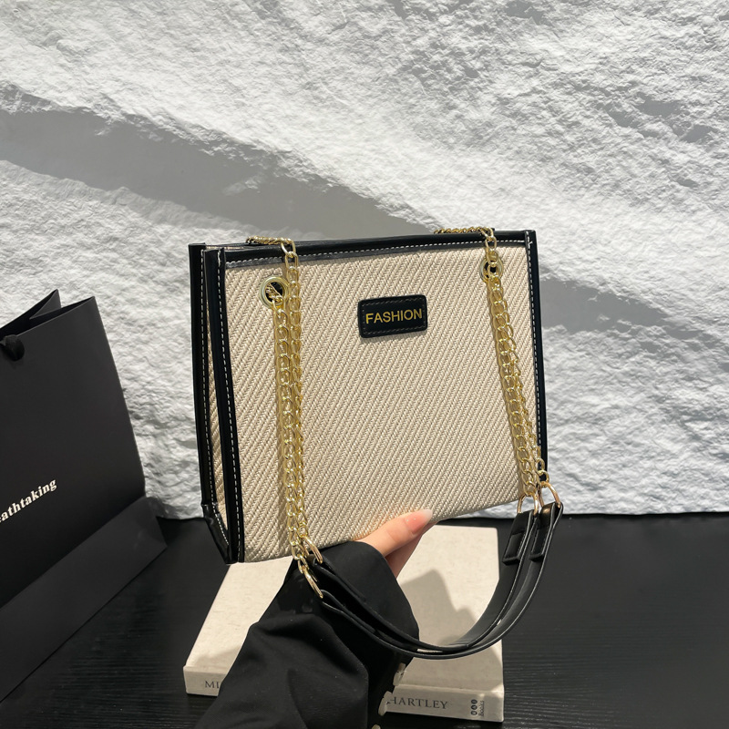 Large-capacity hand-held women's bag 2025 new style trendy color-blocking tote bag, daily commuting single-shoulder crossbody bag for work full figure