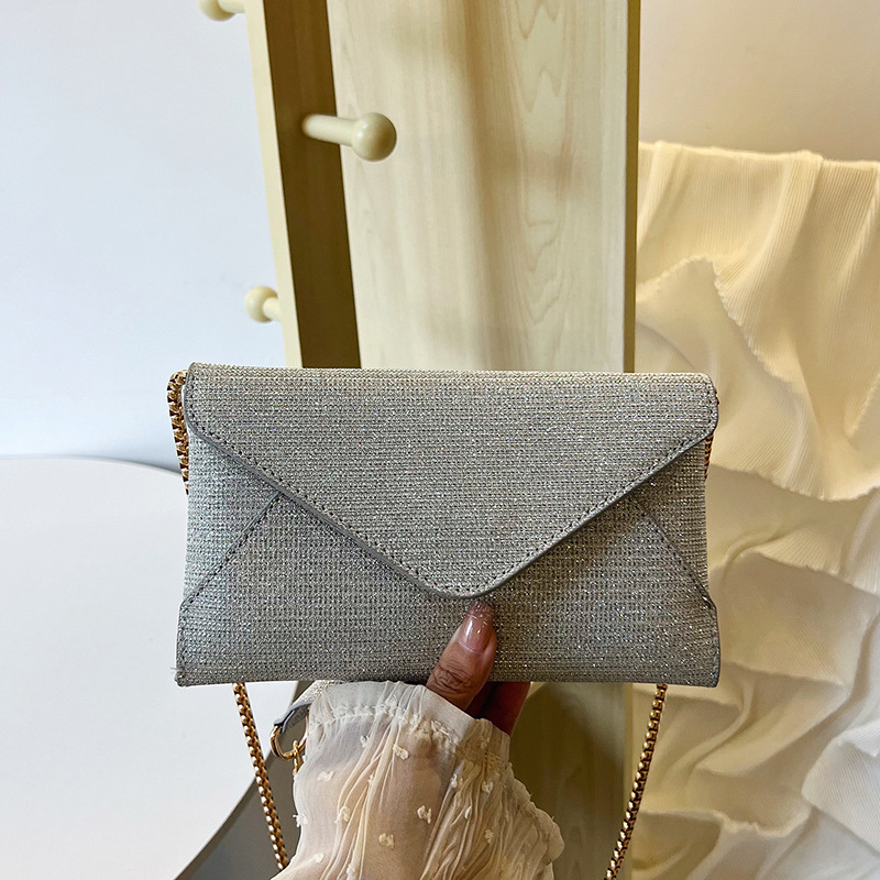 Cross-border wholesale fashion chain hand-held bags for women 2025 New fashion, stylish, shiny crossbody bags, envelopes, coin purges full figure