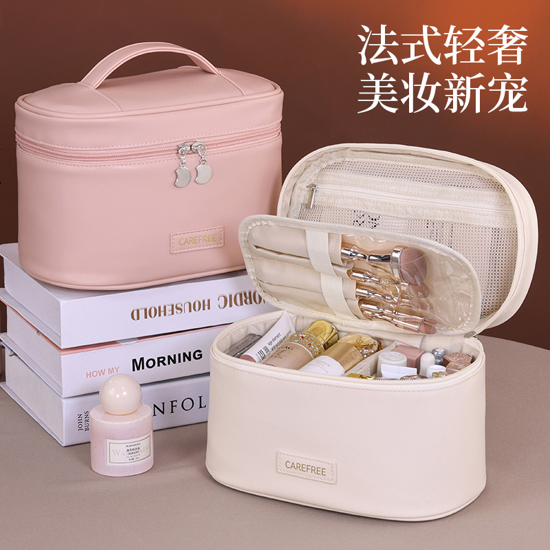 New cross-border products: Oval makeup bag, large capacity, travel portability, hand-held, high-end cosmetic storage bag, toiletry bag full figure