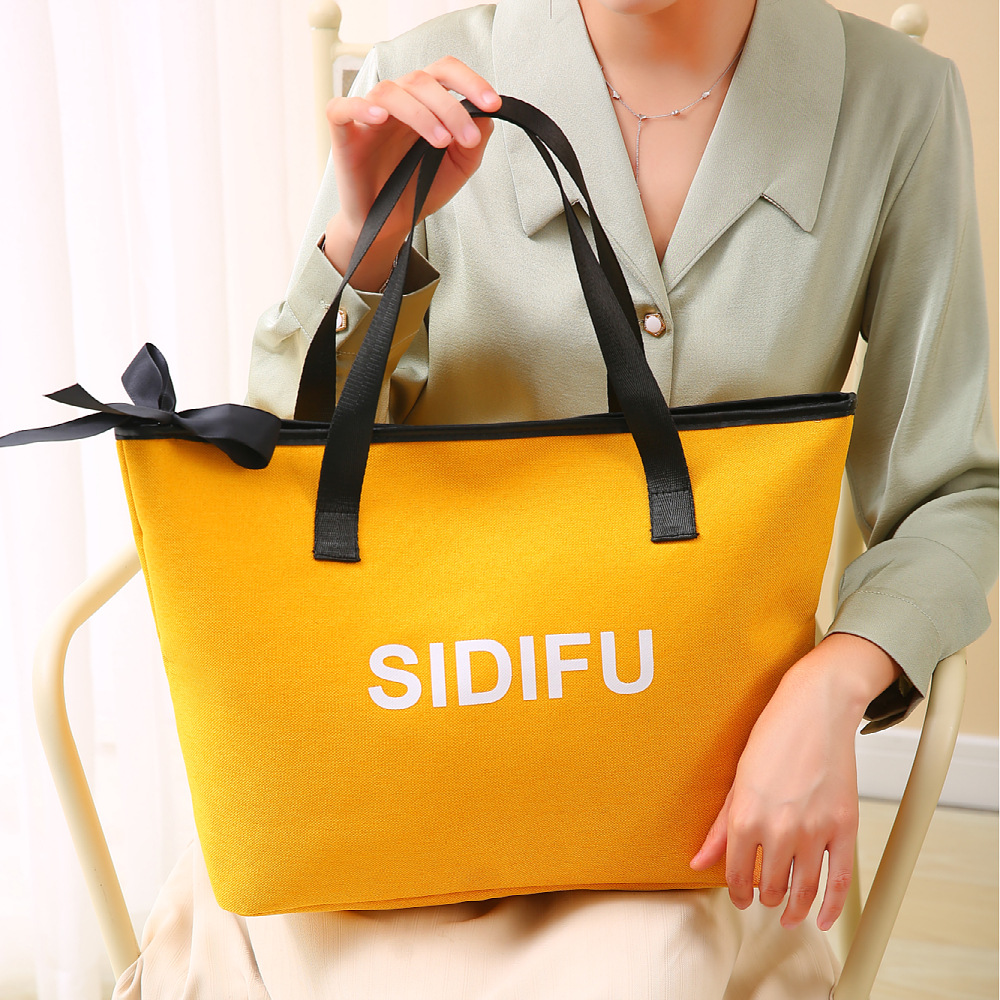Commuting business bag, large-capacity makeup bag, mommy bag, portable handbag, new luggage storage bag, shopping bag details Picture