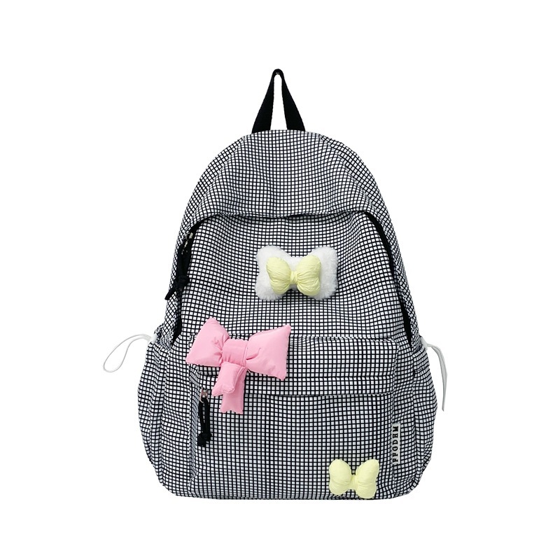 The new summer style of fresh and clean checkered schoolbag for primary school students, cute backpack for junior high school students and girls, ultra-light and lightweight travel backpack Item Picture