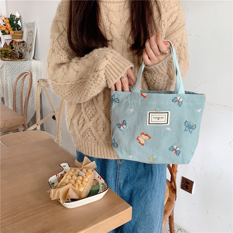 11262 Sky Blue Butterfly embroidered hand-held bag, Korean-style artistic and cute bento bag, small cloth bag for students to carry to work Item Picture