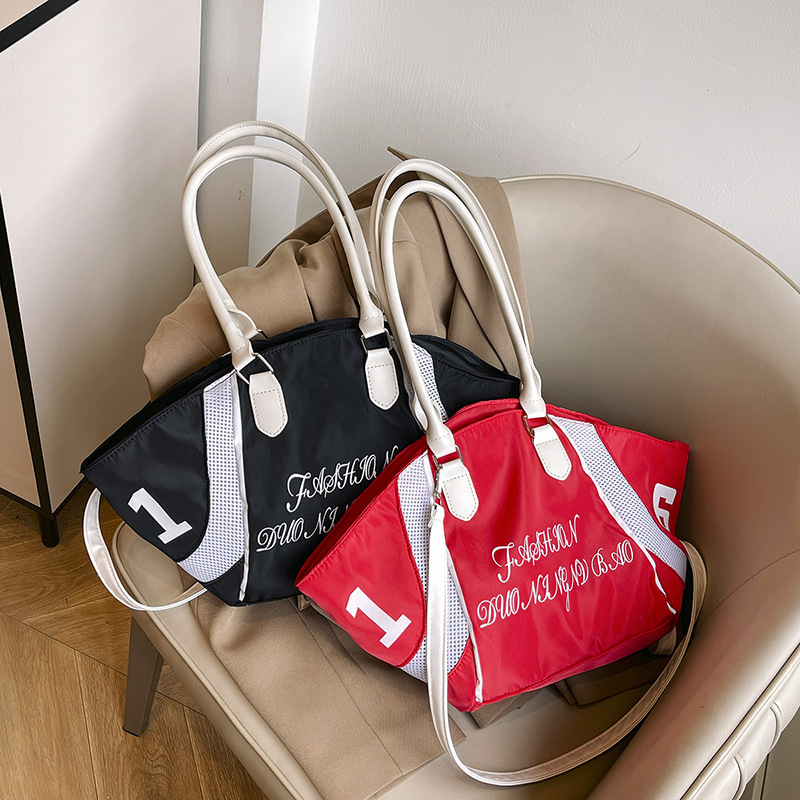Korean niche design letter-embroidered tote bag, canvas single-shoulder handbag, large-capacity shopping bag, underarm women's bag Application Scenario