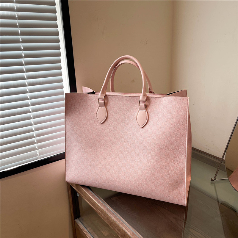 A new 2024 Korean version of a stylish, large-capacity, retro printed hand-held and trendy tote bag for commuting ladies full figure