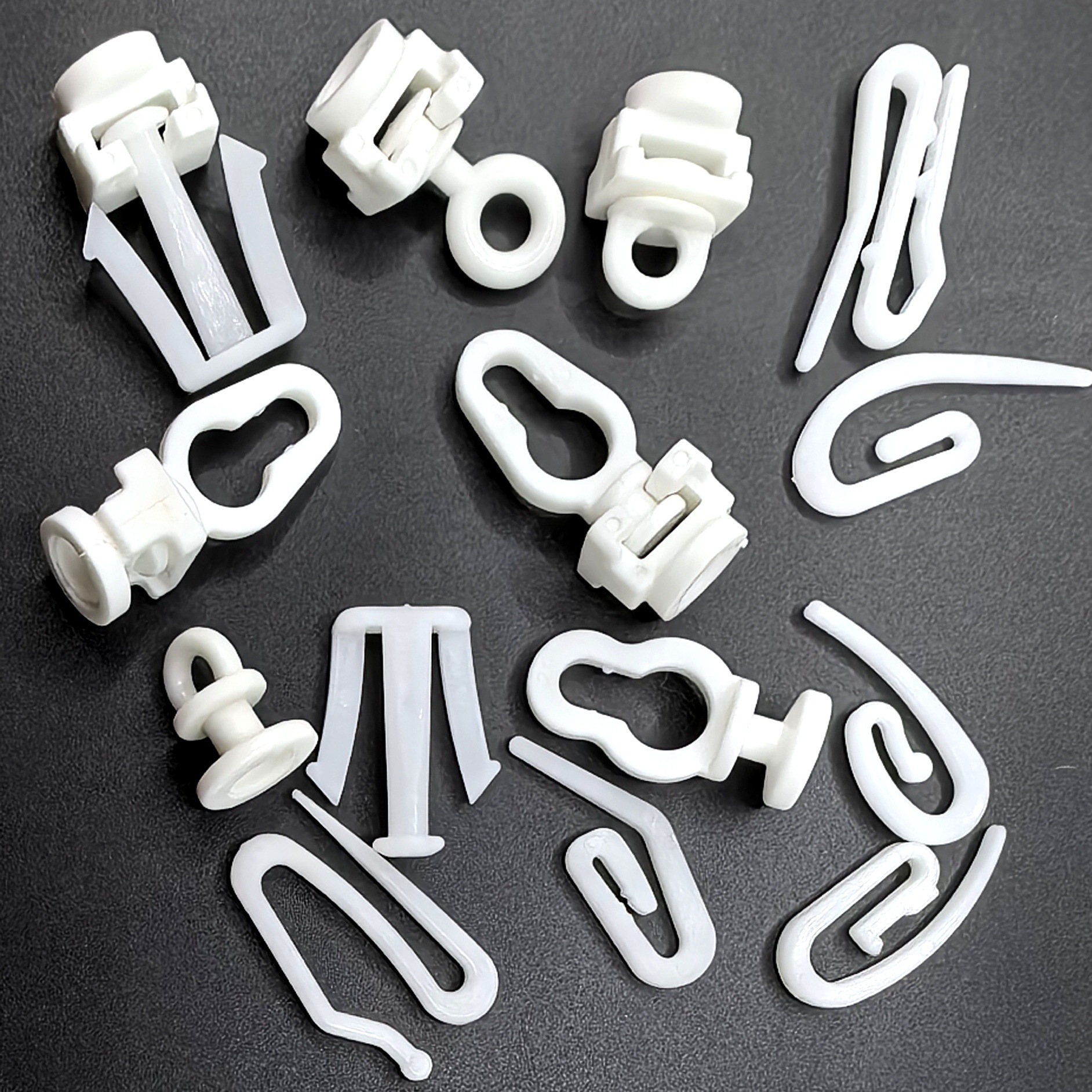 Wholesale snake-shaped curtain special small hook, hanging wheel, curtain plastic hook, slider, bean sprout tip hook, fabric belt hook, accessories and auxiliary materials details Picture