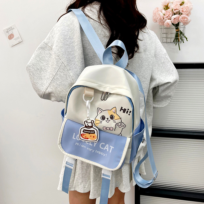 A lightweight and fresh college student casual backpack, a large-capacity, cute cat hand-held crossbody bag, and a cross-border trend Specification drawing