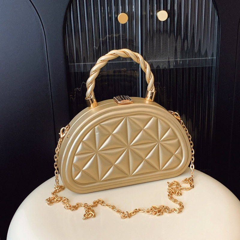Spring 2025 new casual and personalized crossbody bag, a niche design for women, a diamond-shaped hand-held semi-round bag, a fashionable single-shoulder bag full figure