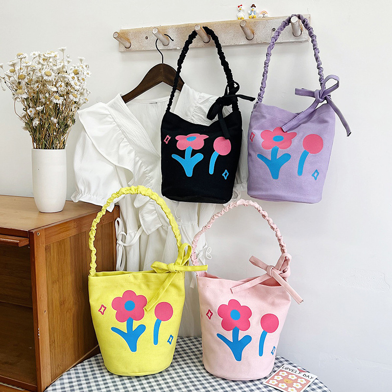 2022 Hand-held children's canvas bag with color printing, casual single-shoulder crossbody bag, outdoor snack bag for boys and girls full figure