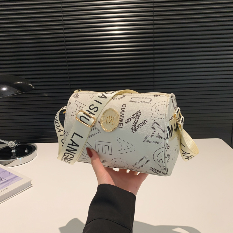 New large-capacity wide-shoulder strap with fashionable printed letters 2025 simple and retro casual crossbody single-shoulder cylindrical bag full figure