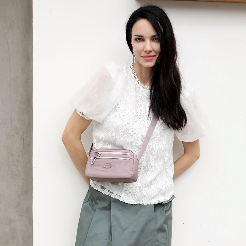 Wholesale of new women's single-shoulder bags, European and American fashion trend crossbody bags, light and simple mobile phone bags, and tree branch pattern backpacks details Picture
