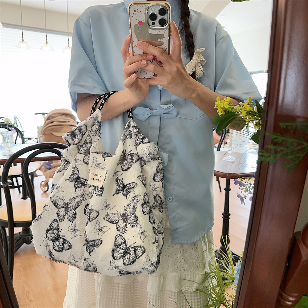 44181 ins large-capacity lace butterfly canvas tote bag for commuting to work and organizing miscellaneous items full figure